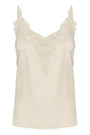 Cream top anna in de kleur zand met kanten details bij de v-hals