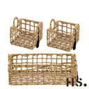 Open mand van naturel zeegras met een metalen frame