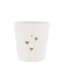 Witte Bastion Collections beker bloom van aardewerk met een hartjes bloemenprint in caramel en donkergrijs.