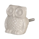 Decoratieve kastknop in de vorm van een uil uitgevoerd in de kleur crème.