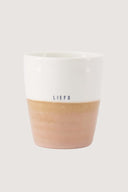Roze koffiemok van Zusss met de tekst liefs