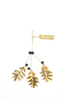 Goudkleurige MrsBloom hanger in de vorm van een blad met zwarte accenten