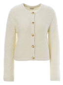 Beige vest van JC Sophie met knoopsluiting en een zachte textuur