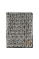 Zusss plaid in de kleur zand met een subtiele geometrische print