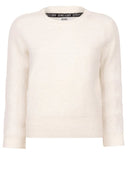 Zoso trui penny in de kleur offwhite met een subtiel glitterdetail in het boord.