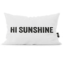 Wit met zwart buitenkussen met tekst Hi Sunshine aan de voorzijde en hartjespatroon aan de achterzijde.