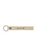 Zusss sleutelhanger heej ga je mee in de kleur zand met zwarte tekst