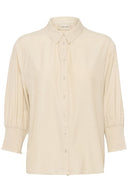 Cream blouse nola in de kleur oatmeal met driekwart mouwen en gesmokte boorden