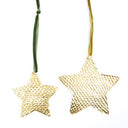 Gouden metalen ster hanger van MrsBloom met een suède ophangkoord
