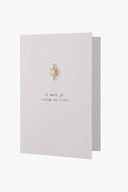 Zusss kerstkaart met een broche in goud en groen