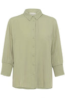 Cream blouse nola in de kleur tea met driekwartmouwen en gesmokte boorden