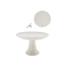 Witte cakestandaard van Bastion Collections met zwarte details op een verhoogde voet.