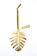 Decoratieve MrsBloom hanger in de vorm van een goudkleurig palmblad van metaal