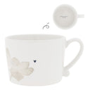 Bastion Collections mok l flower in wit en zwart aardewerk met een titaankleurige bloemprint