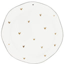 Dinerbord van Bastion Collections in wit aardewerk met een decoratieve rand van zwarte en caramelkleurige hartjes.