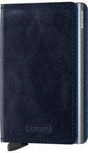 Secrid slimwallet vintage in de kleur blauw met een slank lederen ontwerp en zichtbare aluminium cardprotector.