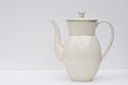 Vintage koffiepot van Porzellanfabrik Arzberg in crème met goudkleurige en groene details.