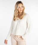 Esqualo vest in off white met V-hals en ruffle details aan de boorden