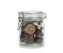 Glazen weckpot van Rustik Lys gevuld met chocoladekleurige theelichtjes en een Perfect Day sticker op het deksel