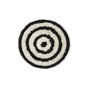 Ronde badmat van HKliving met een grafisch zwart-wit patroon